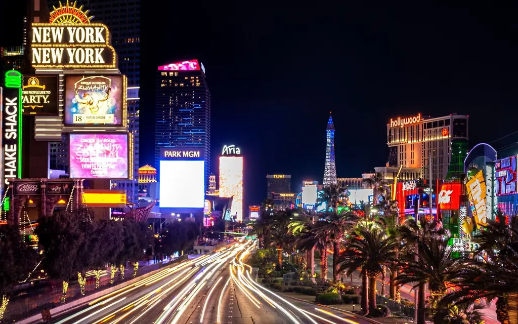 Experience the vibrant neon lights and nightlife of the iconic Las Vegas Strip at night